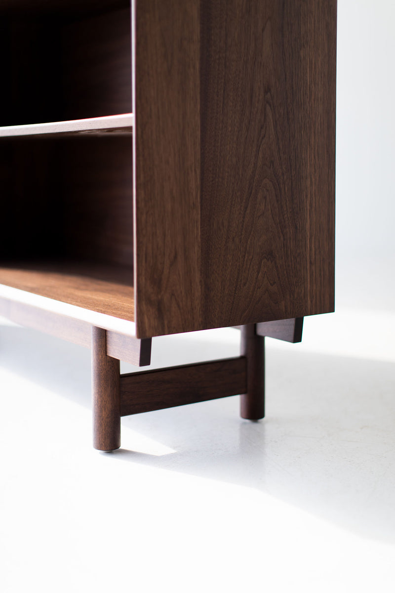 Modern luxury Peabody walnut bookcase styled in a living room