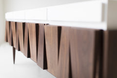 Side profile of the modern walnut credenza