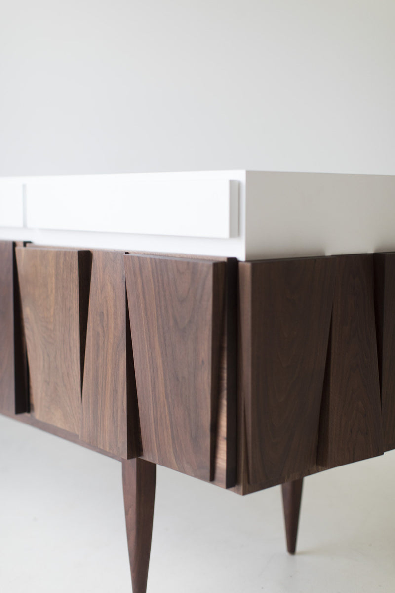 Angled view of the Craft Associates walnut credenza