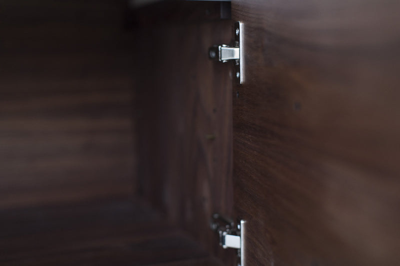 Detail of the door pulls on the modern walnut credenza