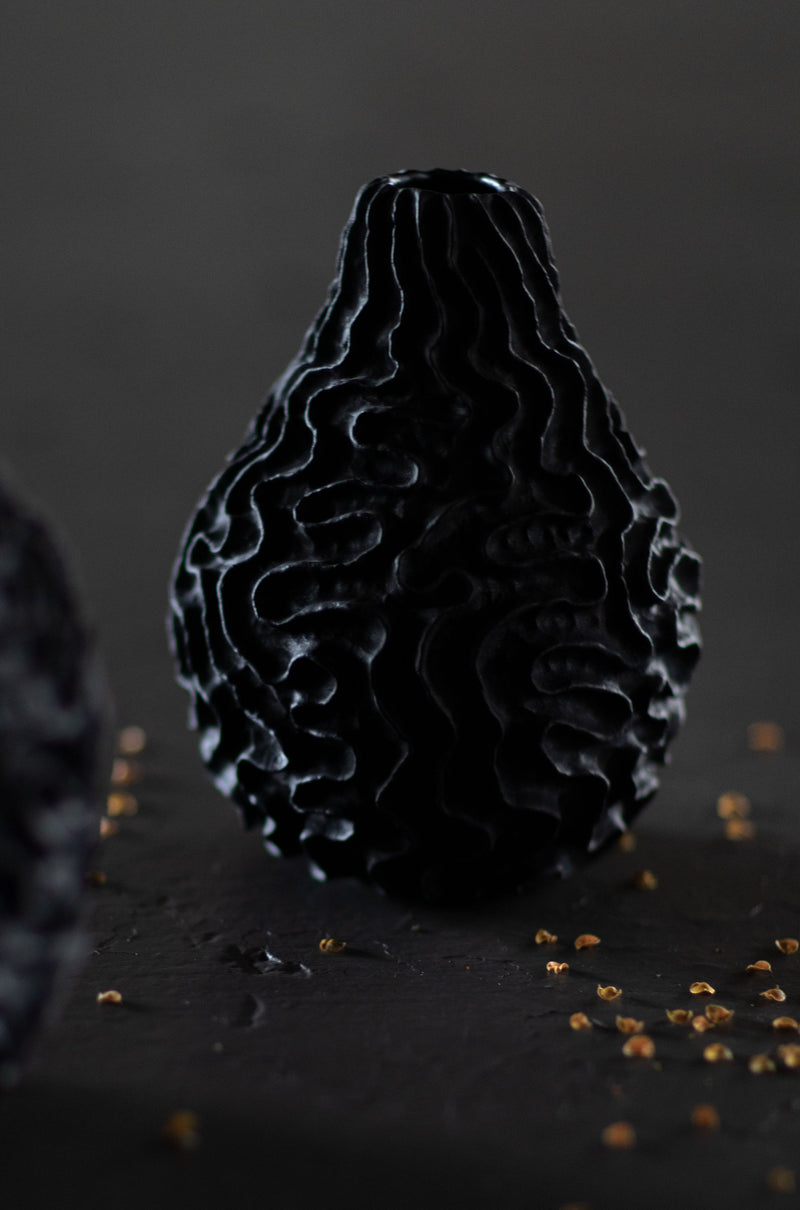 Angled view of the Suzy Goodelman pottery piece