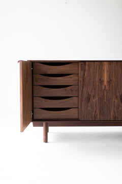 Detail of the solid black walnut grain on the modern luxury Peabody credenza