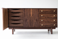Modern luxury walnut Peabody credenza styled in a modern dining room