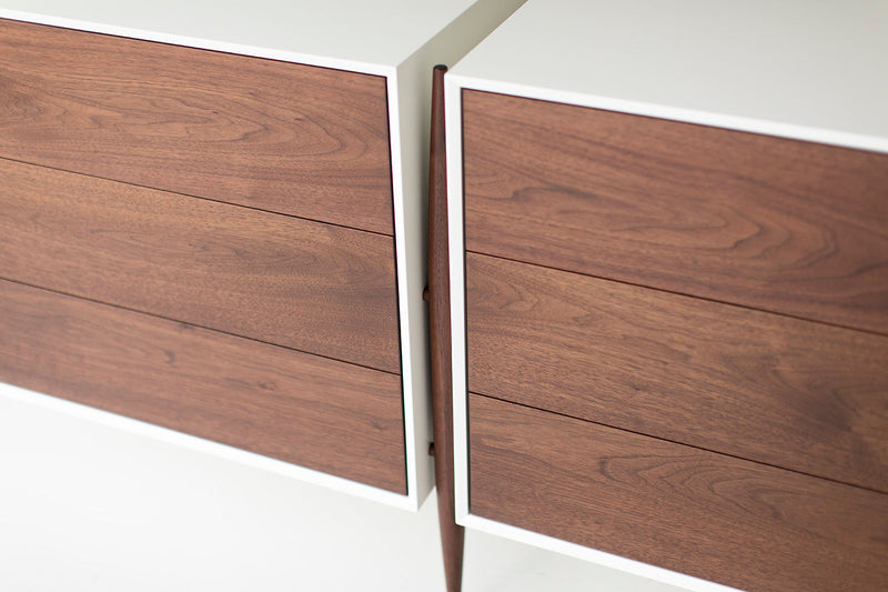 Close-up of rich walnut wood grain on a modern luxury Cambre dresser