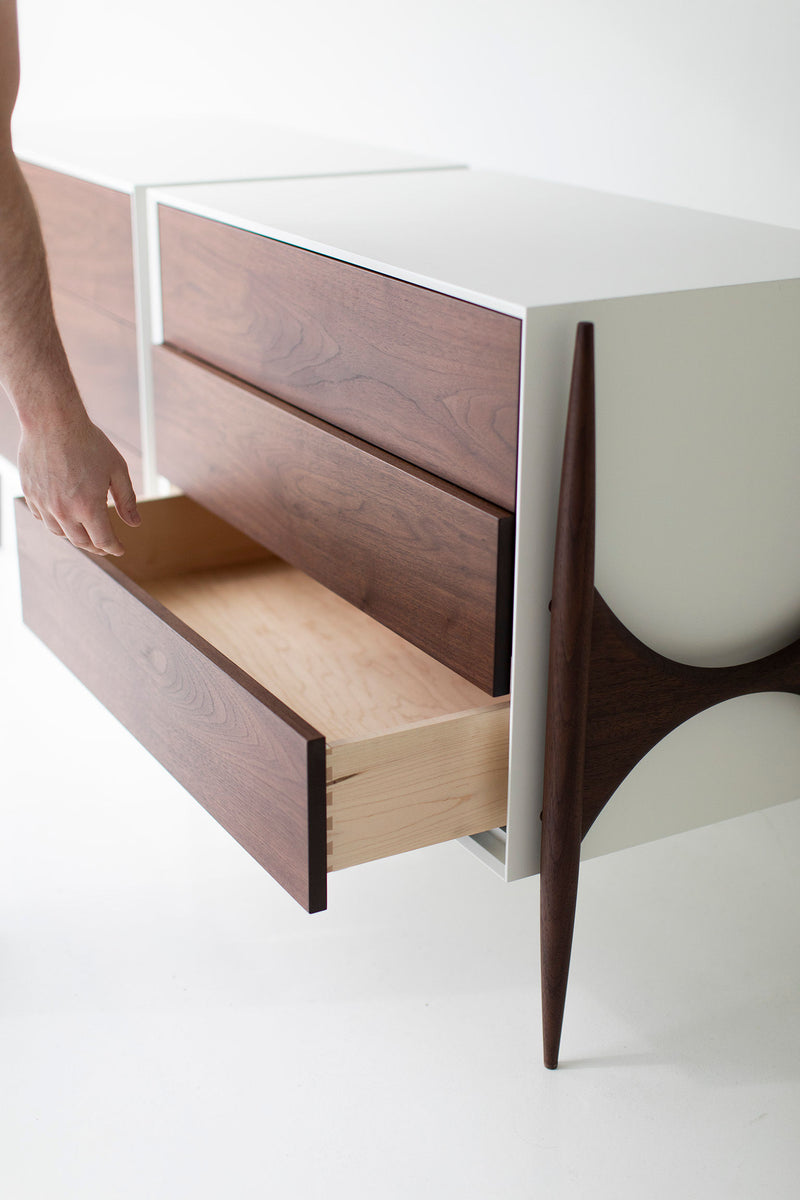 Modern luxury Cambre walnut dresser styled in a contemporary bedroom