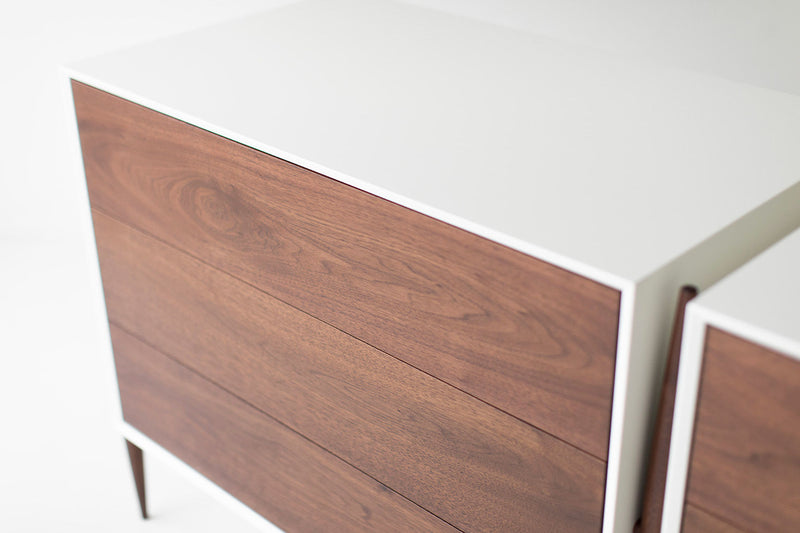 Angled view of the modern luxury Cambre Collection walnut dresser