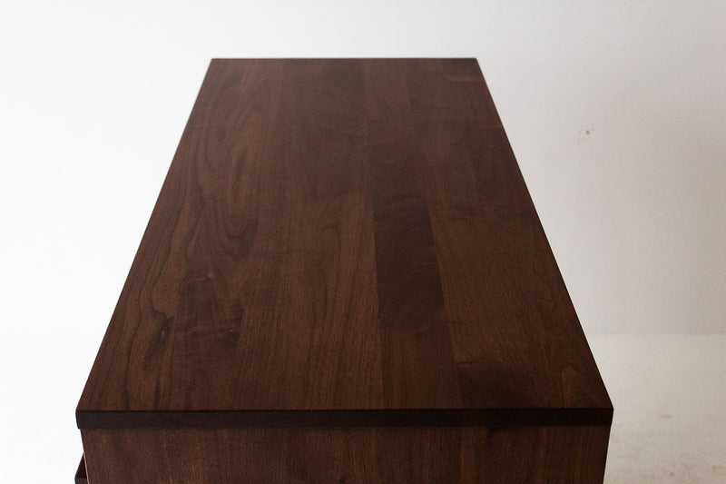 Detail of the hand-finished matte top on the modern luxury walnut nightstand