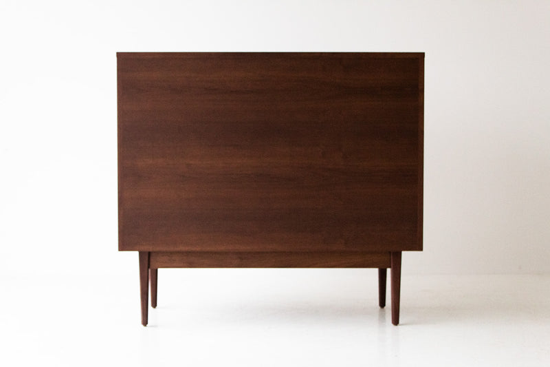 Modern luxury walnut nightstand used as a side table beside a sofa
