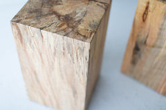 Natural maple stump table at a three-quarter angle