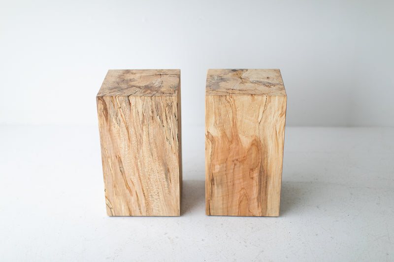 Maple stumps grouped as a modern coffee table