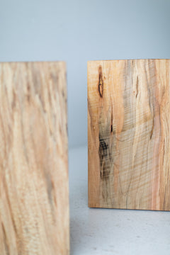 Hand-sanded edge and clear commercial finish on the stump top
