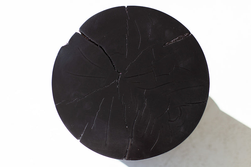 Hand-sculpted curve of the Tulum stool