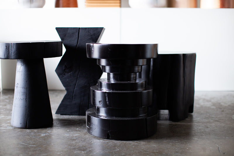 Several Tulum stools grouped into a larger table