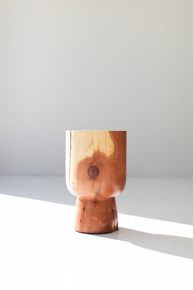Modern luxury red cedar side table in a bright organic modern interior