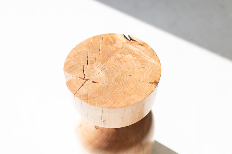 Maple Roma stump table photographed at an angle