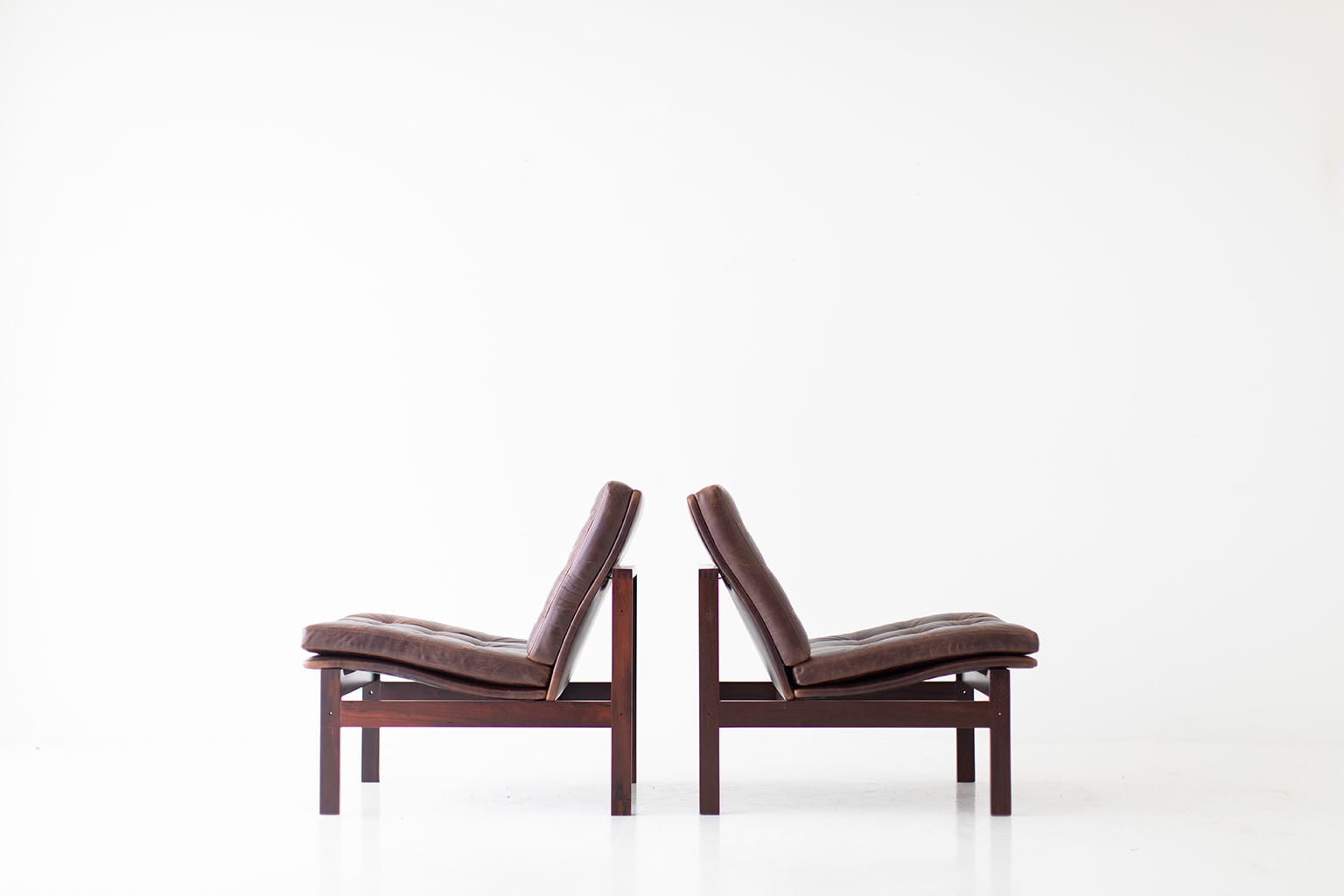 Ole Gjerløv Knudsen & Torben Lind Rosewood and Leather Lounge Chairs