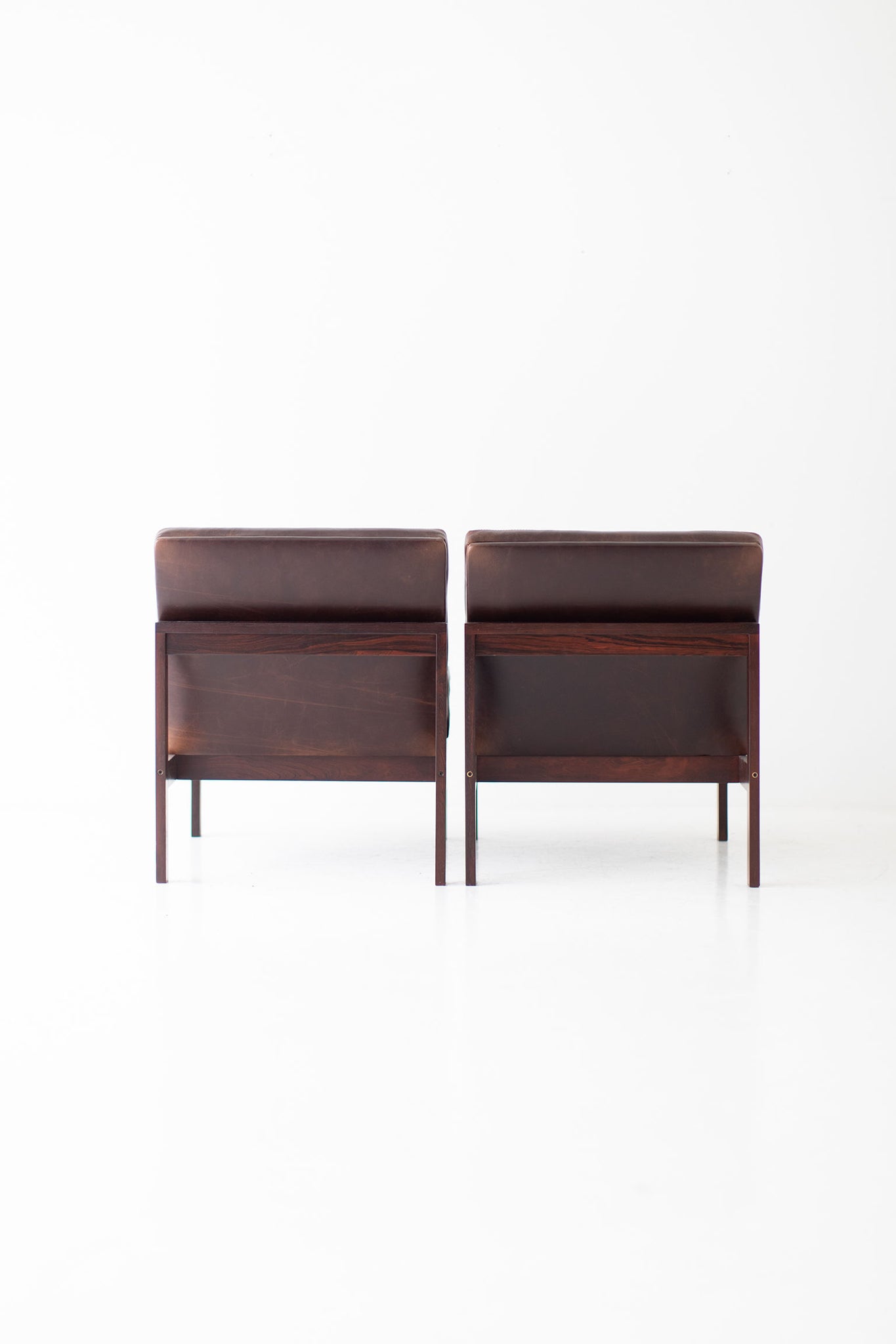 Ole Gjerløv Knudsen & Torben Lind Rosewood and Leather Lounge Chairs