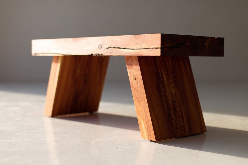 Organic modern coffee table styled in a bright interior