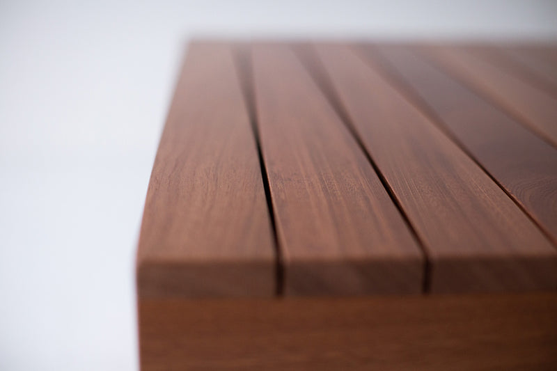 Bali outdoor end table at a three-quarter angle