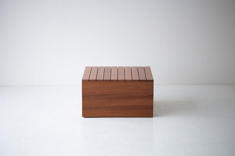 Organic modern Bali end table in a bright outdoor seating area