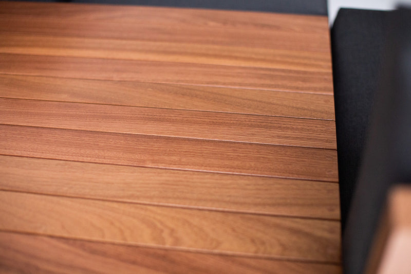 Close-up of the slatted side table