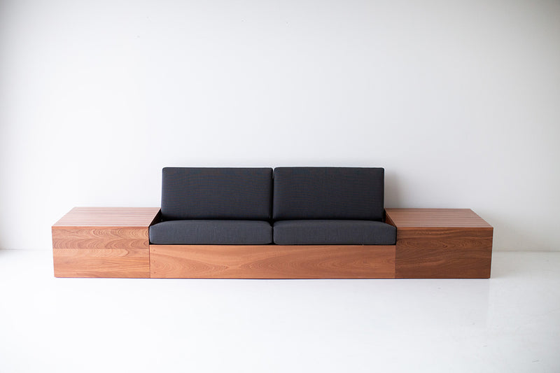 Modern luxury Sapele mahogany sofa styled in a bright outdoor space