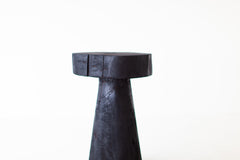 Shou sugi ban side table shown at an angle