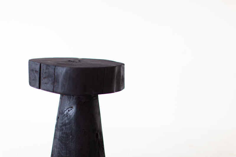 Shou sugi ban tables grouped as an organic modern coffee table