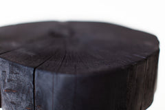 Shou sugi ban table used as a stool