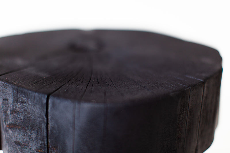 Shou sugi ban table used as a stool