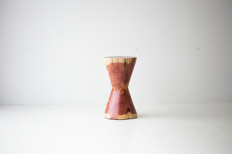 Close-up of the natural red cedar grain and character cracking on The Hourglass