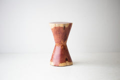 The Hourglass modern wood stump side table styled in an organic-modern living room