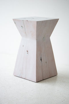 The Sol modern maple side table in a bright, organic modern living space