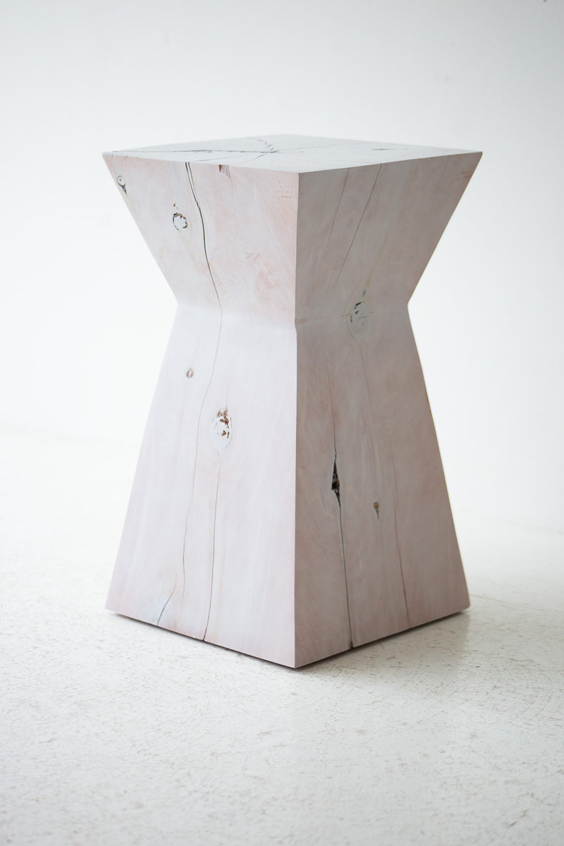 The Sol modern maple side table in a bright, organic modern living space