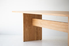 White oak Toko dining table shown at an angle