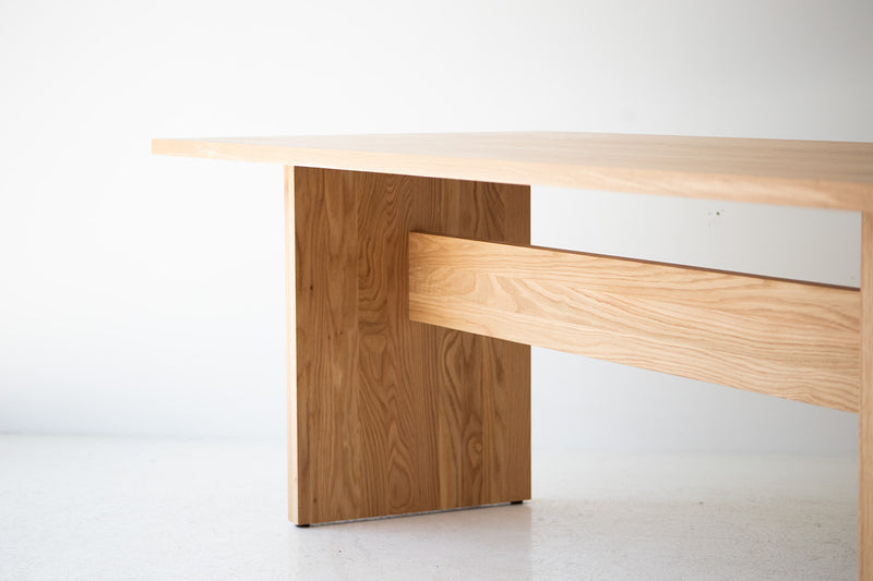 White oak Toko dining table shown at an angle