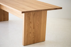 Modern luxury Toko dining table styled with chairs in a dining room