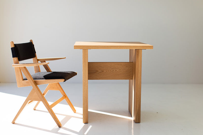 The Toko organic modern game table styled as a dining table