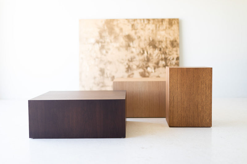 Modern white oak side table styled as a bedside table