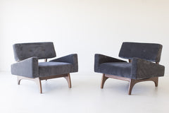 Modern luxury velvet lounge chair, the Canadian, on a walnut base, front view