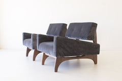 Angled view of the modern Canadian lounge chair showing its low, wide stance