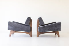 Modern luxury velvet lounge chair styled in a modern living room