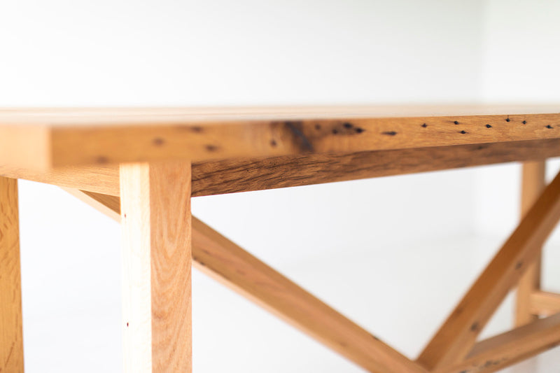 Modern farmhouse dining table showing the luxury solid oak wood grain
