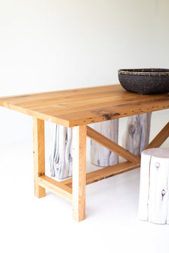 Close-up of the handcrafted solid oak top on the modern luxury farmhouse table