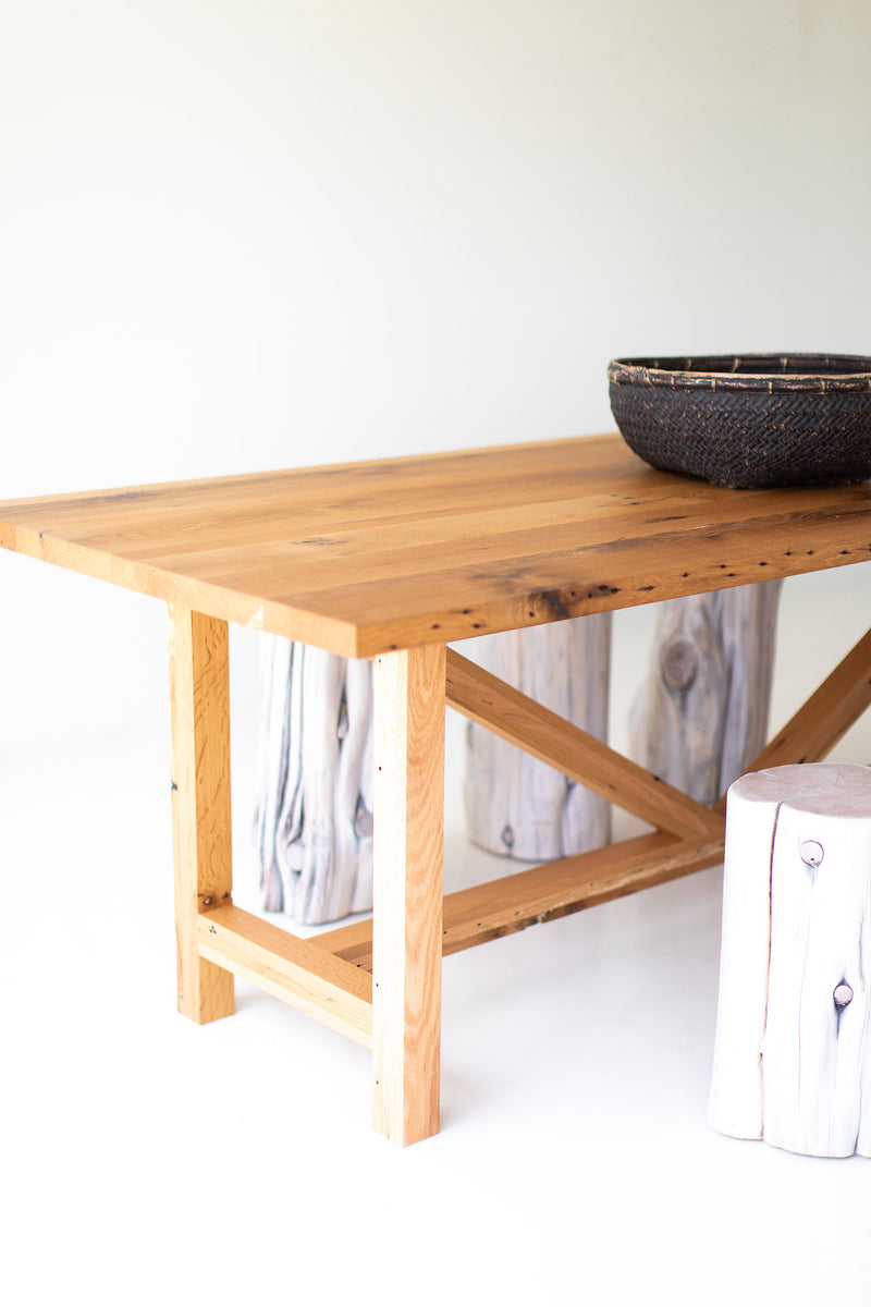 Close-up of the handcrafted solid oak top on the modern luxury farmhouse table