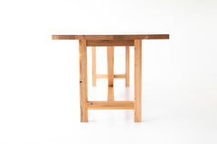 Detail of the commercial-grade finish on the modern luxury oak tabletop