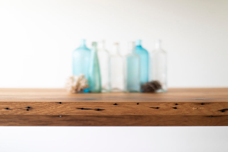 Close-up of the solid oak legs on the modern luxury farmhouse table