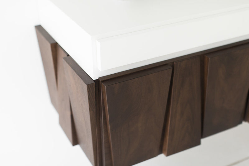 Craft Associates floating credenza showing walnut cabinet doors