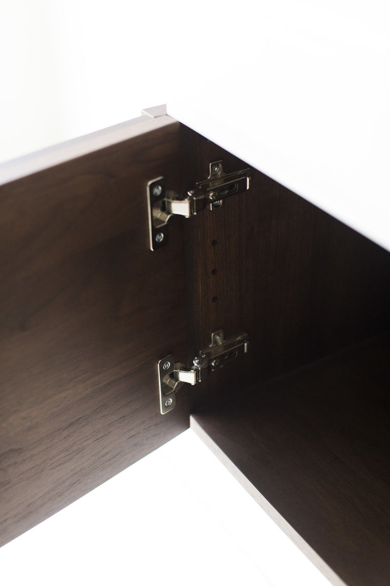 Angled view of the Craft Associates floating walnut credenza