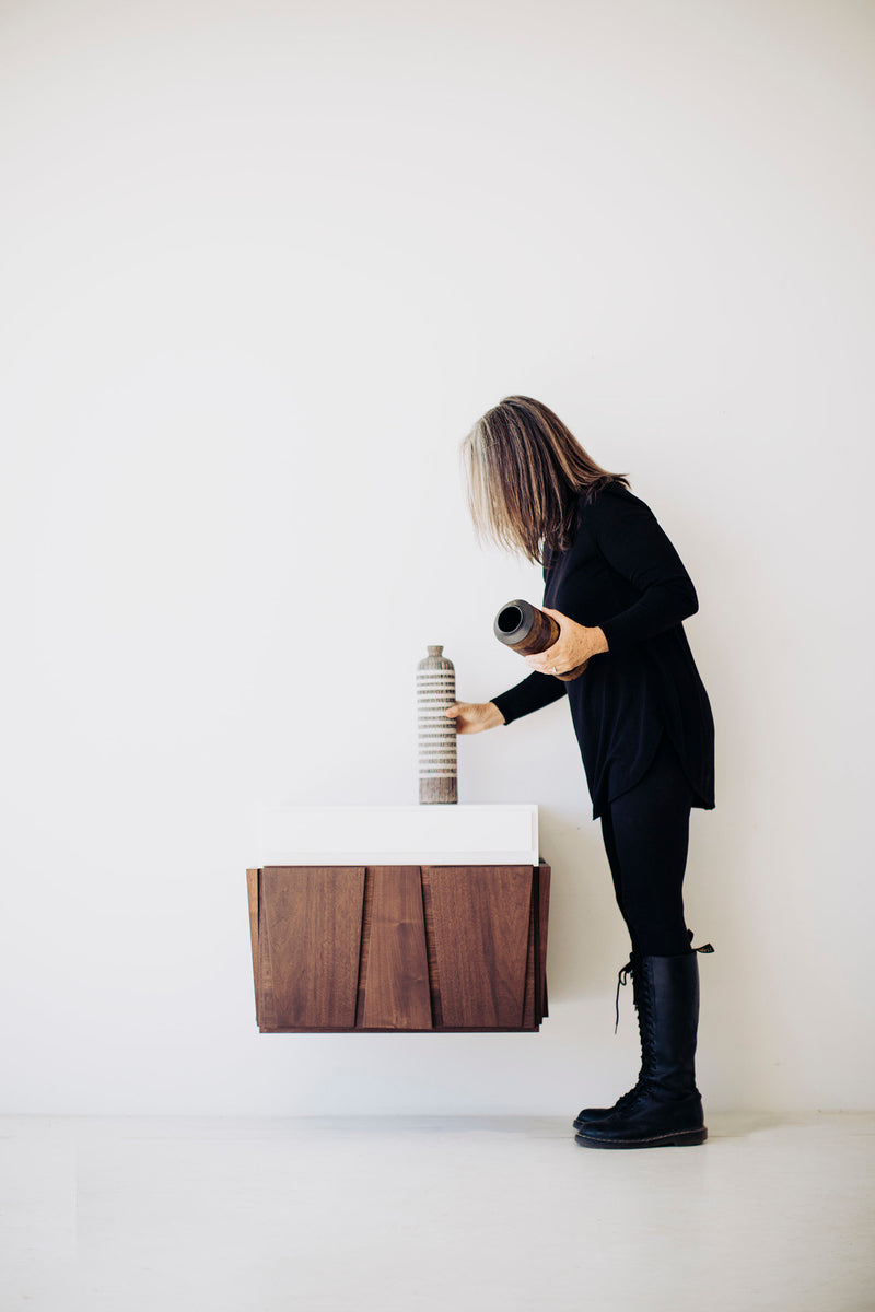 Side profile of the floating walnut nightstand